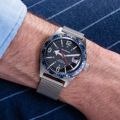 Milanese band on blue automatic watch